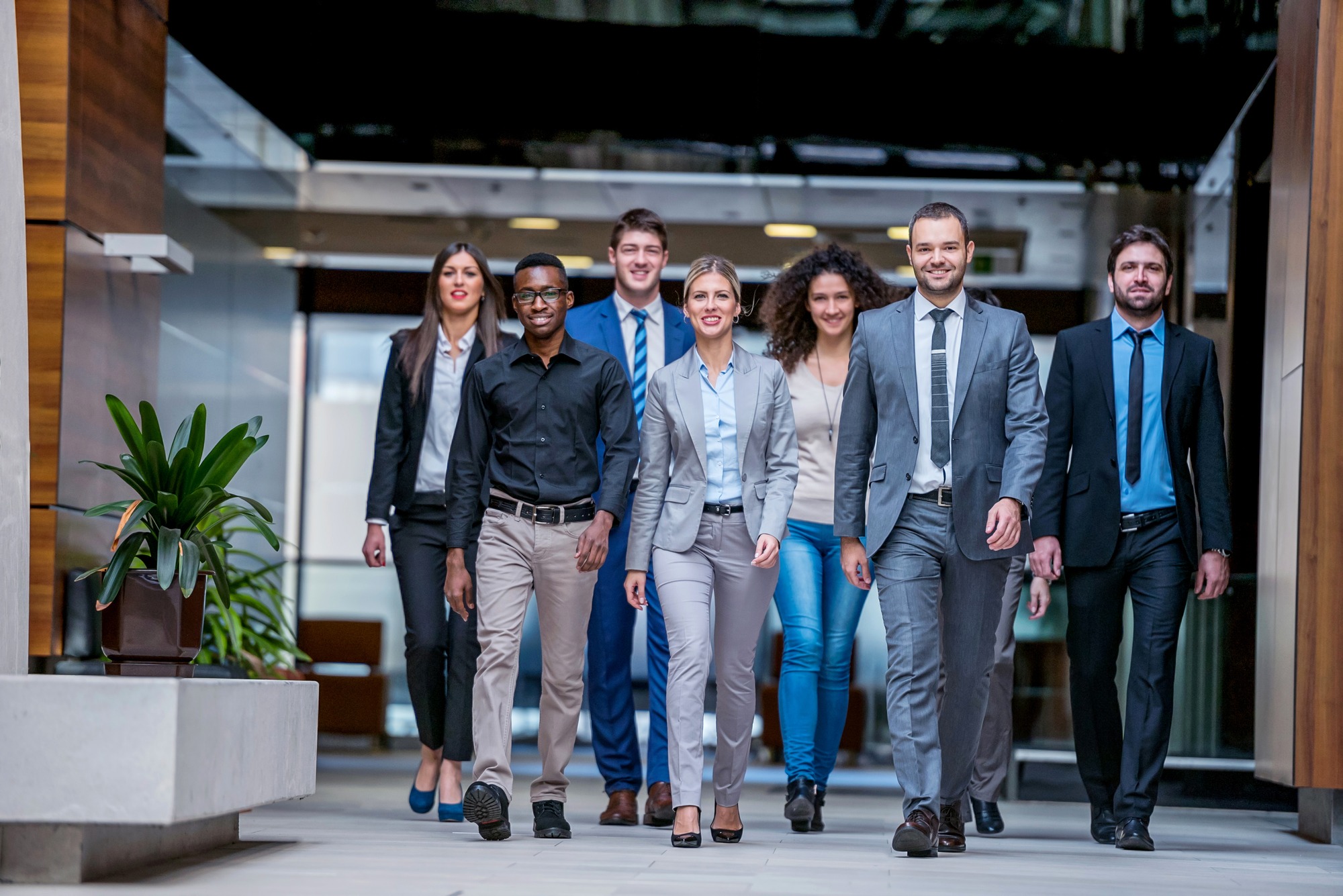A group of diverse business people walking together